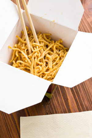 fast food. chinese noodles in paper boxの写真素材