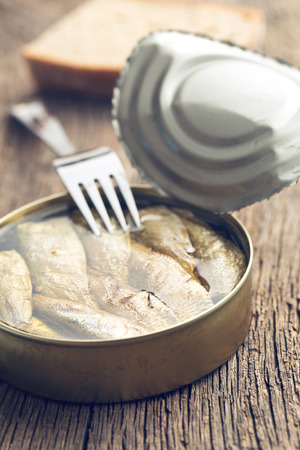 can of sprats on kitchen tableの写真素材