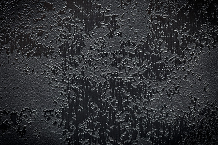 the abstract black textured backgroundの写真素材