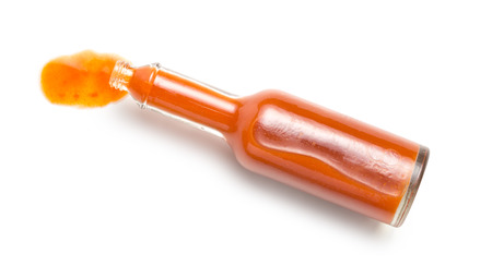 red tabasco on white backgroundの写真素材