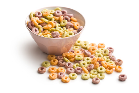 colorful cereal rings in bowl on white background