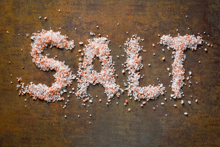 Himalayan salt on rusty background