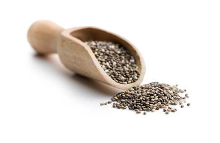chia seeds in scoop on white backgroundの写真素材