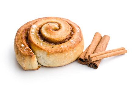 cinnamon bun on white backgroundの写真素材