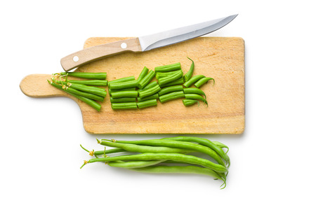 chopped green beans on white background