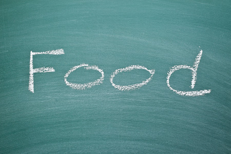 the inscription food on chalkboardの写真素材