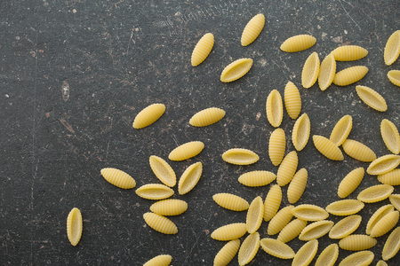 top view of uncooked italian pastaの写真素材