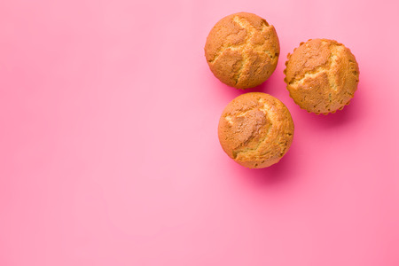 sweet muffins on pink backgroundの写真素材