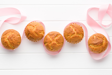 sweet muffins on white kitchen table