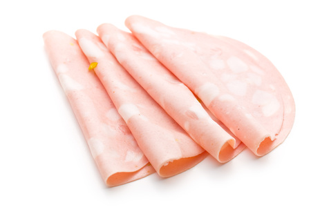 Slices of Sausage Mortadella on white backgroundの写真素材