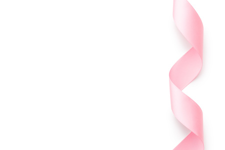 the pink ribbon curls on a white backgroundの写真素材