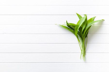 Fresh ramsons leaves. Wild garlic leaves. Healthy vegetable.