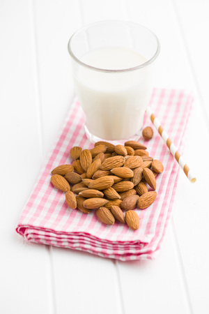 Almond milk and almonds. Tasty milk in glass.の写真素材