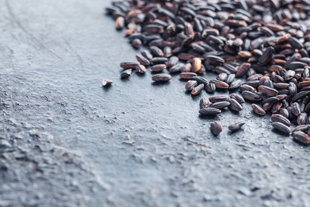 The nerone rice. On old kitchen background.の写真素材