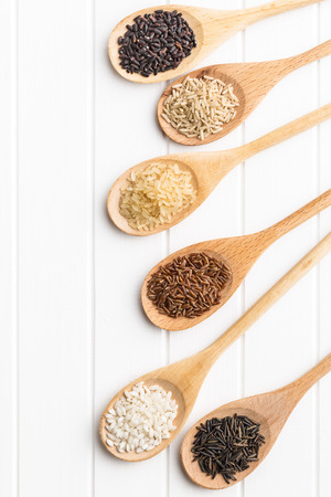 Different rice varieties on kitchen table. Top view.の写真素材
