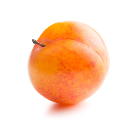 Ripe yellow plum isolated on white background.の写真素材