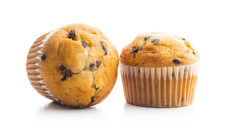 The tasty chocolate muffin isolated on white background.の写真素材