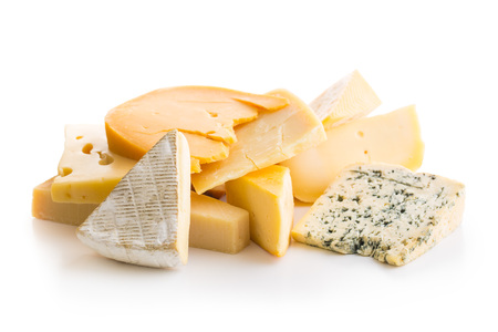 Different kinds of cheeses isolated on white background.の写真素材