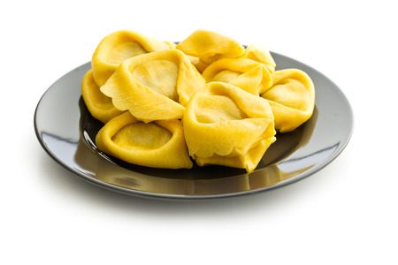 Italian traditional tortellini pasta on plate isolated on white background.の写真素材