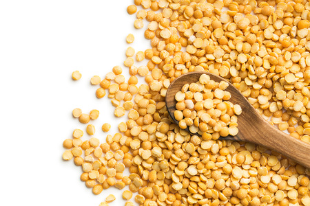 Yellow split peas isolated on white background.の写真素材