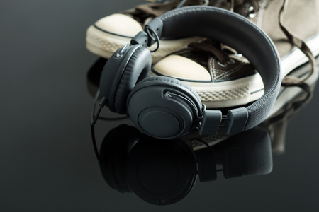The headphones and vintage sneakers.の写真素材