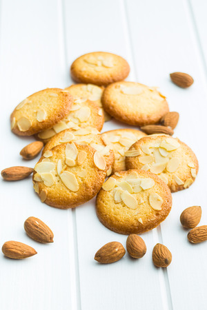 Sweet almond cookies on white wooden table.の写真素材