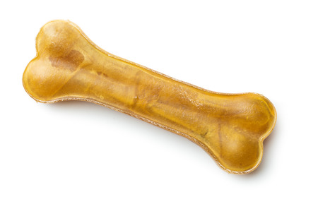 Dog chew bone isolated on white background. Top view.の写真素材
