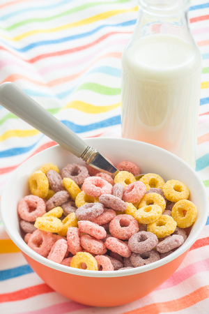 Colorful cereal rings and milk.の写真素材