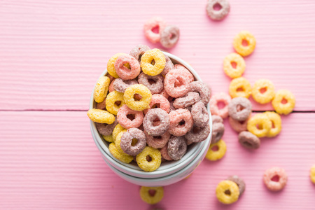 Colorful cereal rings in bowl.