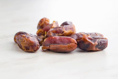 Sweet dates without stones on kitchen table.の写真素材