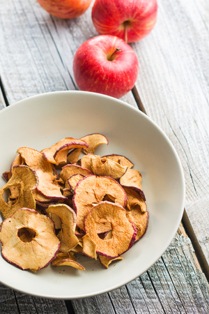 Tasty dried apple slices in plate.の写真素材