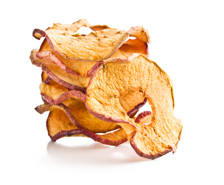 Tasty dried apple slices isolated on white background.の写真素材
