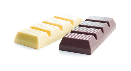 Dark and white chocolate bar isolated on white background.の写真素材