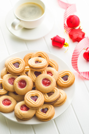 Xmas decoration and jelly cookies with coffee.の写真素材