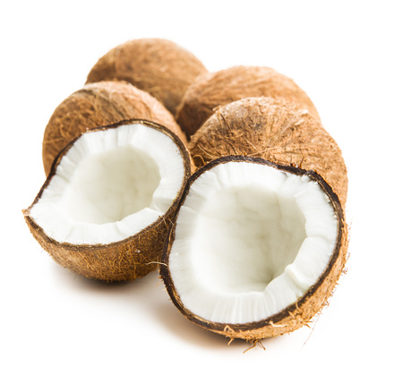 The halved coconuts isolated on white background.の写真素材