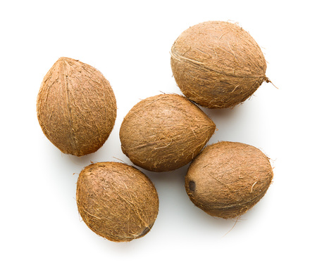 The whole coconuts isolated on white background.の写真素材