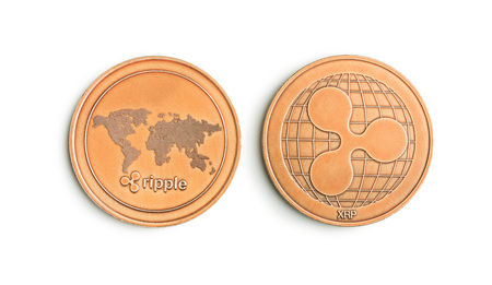 Golde ripple coins. Altcoins isolated on white background.の写真素材