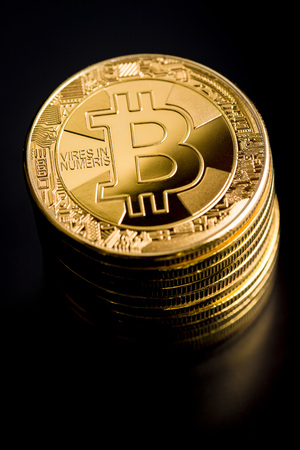 Bitcoin. Digital cryptocurrency on black table.の写真素材