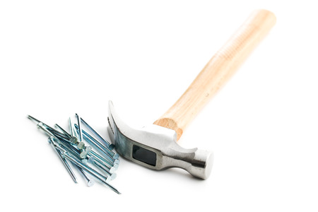 Hammer and nails isolated on white background.の写真素材