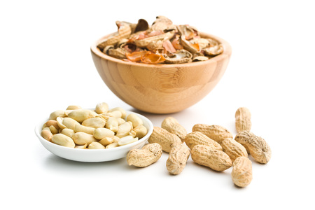 The peeled peanuts isolated on white background.