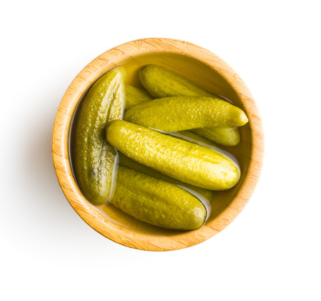 Preserved cucumbers isolated on white background. Tasty pickles.の写真素材