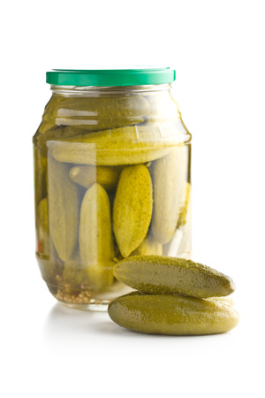 Preserved cucumbers isolated on white background. Tasty pickles.の写真素材