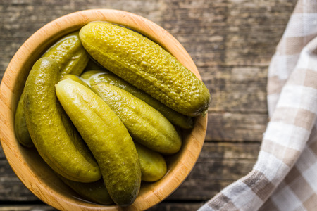 Pickles in bowl. Tasty preserved cucumbers.の写真素材