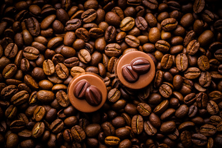 Belgian pralines with coffee flavor and coffee beans.