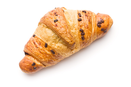Croissant with chocolate crumbs isolated on white background.の写真素材