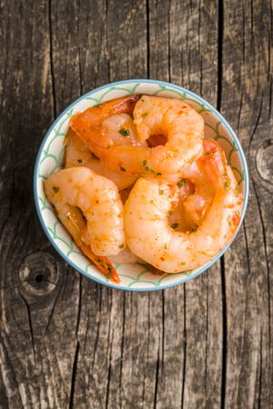 Tasty marinated shrimps in bowl. Top view.の写真素材
