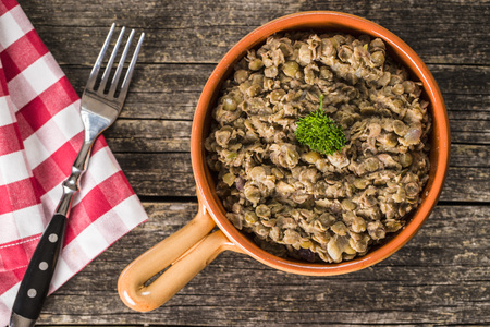 The cooked lentils in bowl.の写真素材