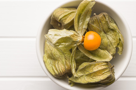 Physalis peruviana fruit in bowl. Top view.の写真素材