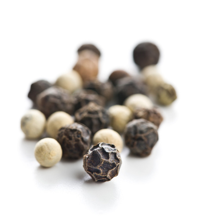 Different types of dried peppercorn isolated on white background.の写真素材