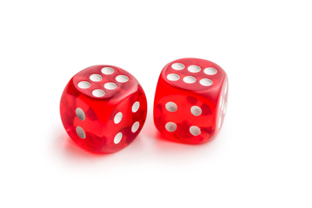 Red glass playing dices isolated on white background.